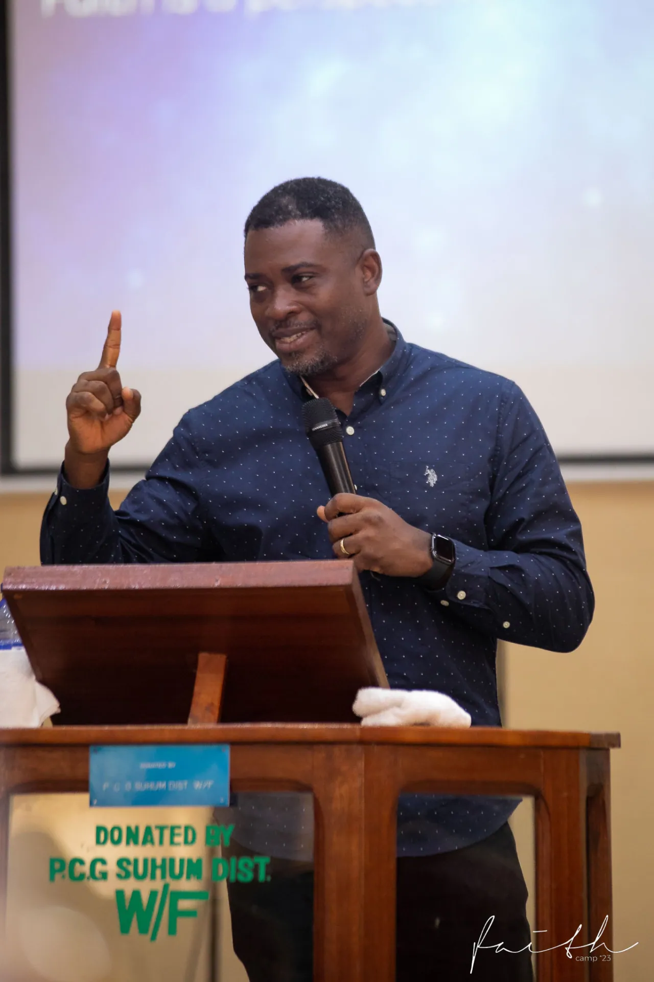 A teacher speaking at a Bible Study Buddies gathering