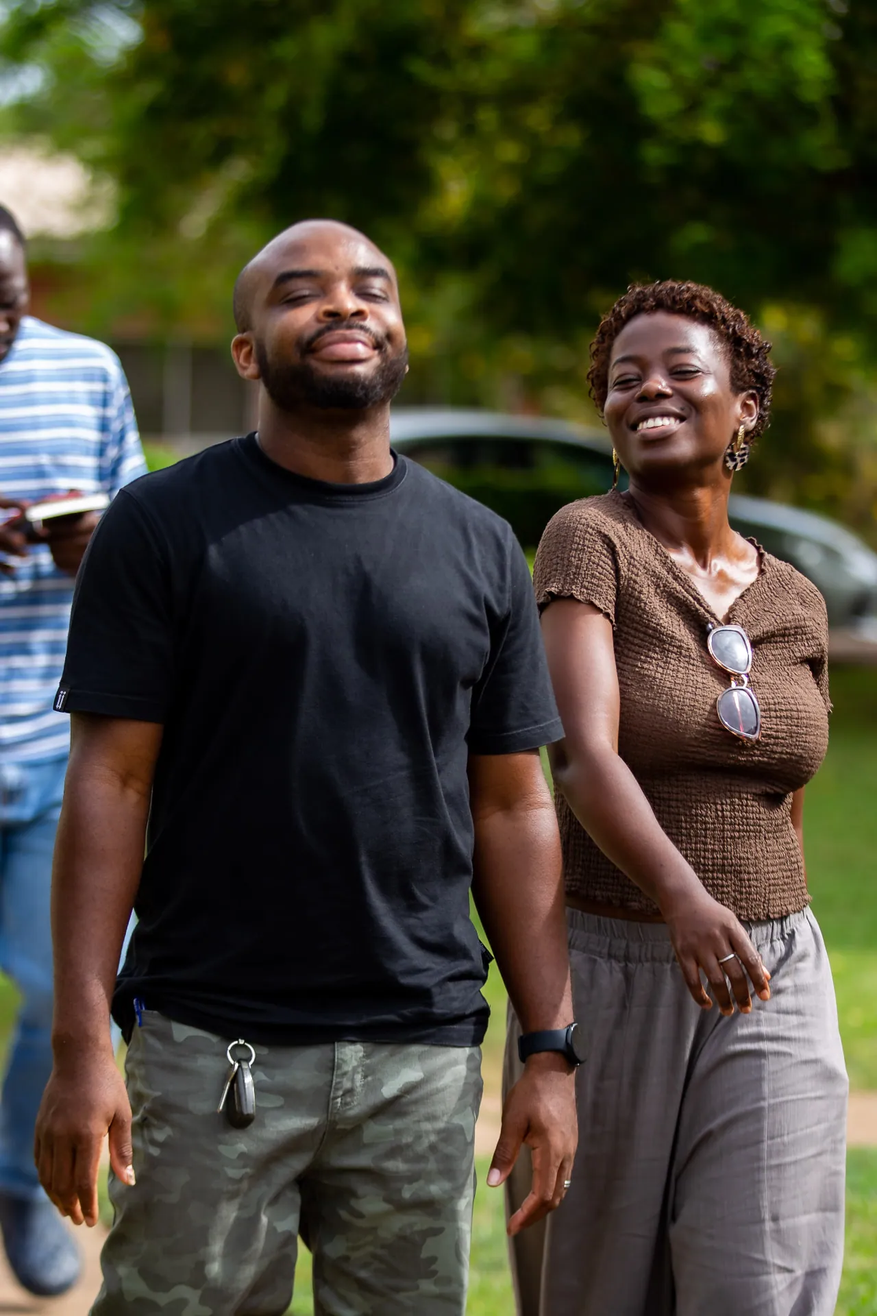 Two friends laughing together at Faith Camp